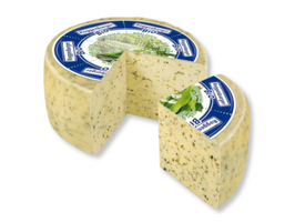 KI generiert: Das Bild zeigt ein Stück Blauschimmelkäse. Der Käse hat eine helle Farbe mit blauen Adern.