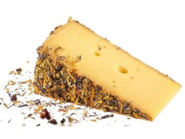 KI generiert: Ein Stück Käse mit Kräutern an der Rinde.