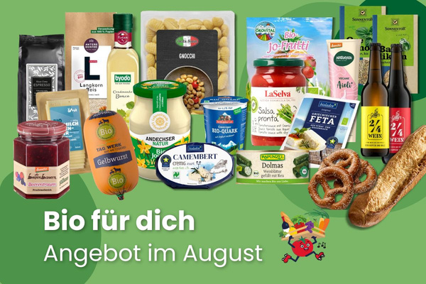 KI generiert: Das Bild zeigt zwei Personen in grüner Arbeitskleidung, die lächelnd eine Kiste mit frischem Obst und Gemüse halten. Im Hintergrund sind weitere Kisten mit Tomaten, Äpfeln und Salat zu sehen, was auf ein Lager oder eine Verkaufsstelle für frische Lebensmittel hinweist.