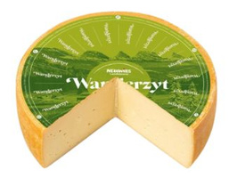 KI generiert: Das Bild zeigt ein Glas mit einem Lebensmittelprodukt namens "Wilde Weidekuh Carlo" in der Geschmacksrichtung "Curry & Dattel". Auf dem Etikett des Glases ist eine stilisierte Kuh abgebildet.