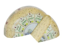 KI generiert: Ein halbierter Laib Kräuterkäse mit einem Stück abgeschnitten. Text: "Käselust".