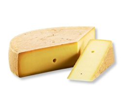 KI generiert: Ein Stück Hartkäse mit einer Scheibe, beide zeigen Löcher.