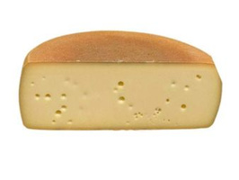 KI generiert: Ein Stück halbrunder Käse mit Löchern auf weißem Hintergrund.