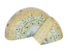 KI generiert: Das Bild zeigt ein Glas mit einem Lebensmittelprodukt namens "Wilde Weidekuh Carlo" in der Geschmacksrichtung "Curry & Dattel". Auf dem Etikett des Glases ist eine stilisierte Kuh abgebildet.