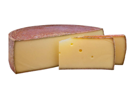 KI generiert: Das Bild zeigt ein Stück Blauschimmelkäse. Der Käse hat eine helle Farbe mit blauen Adern.