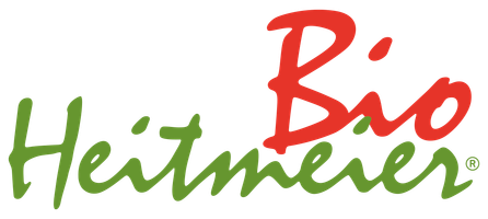 KI generiert: Logo mit Schriftzug "Bio Heitmeier" in grüner und roter Schrift.