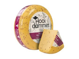 KI generiert: Eine runde Käsesorte, teilweise geschnitten; Text: "Hooi dammer BIO".